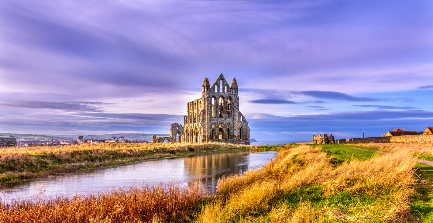 The ruins of Whitby Abbey on the headland above the town
